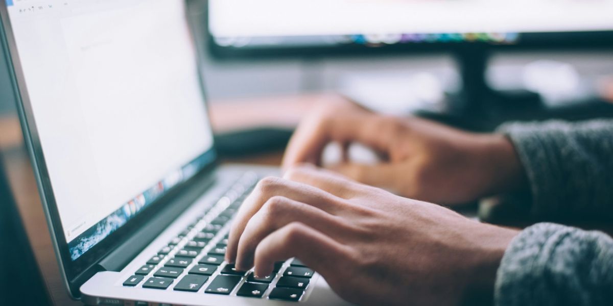 Person using Macbook Pro
